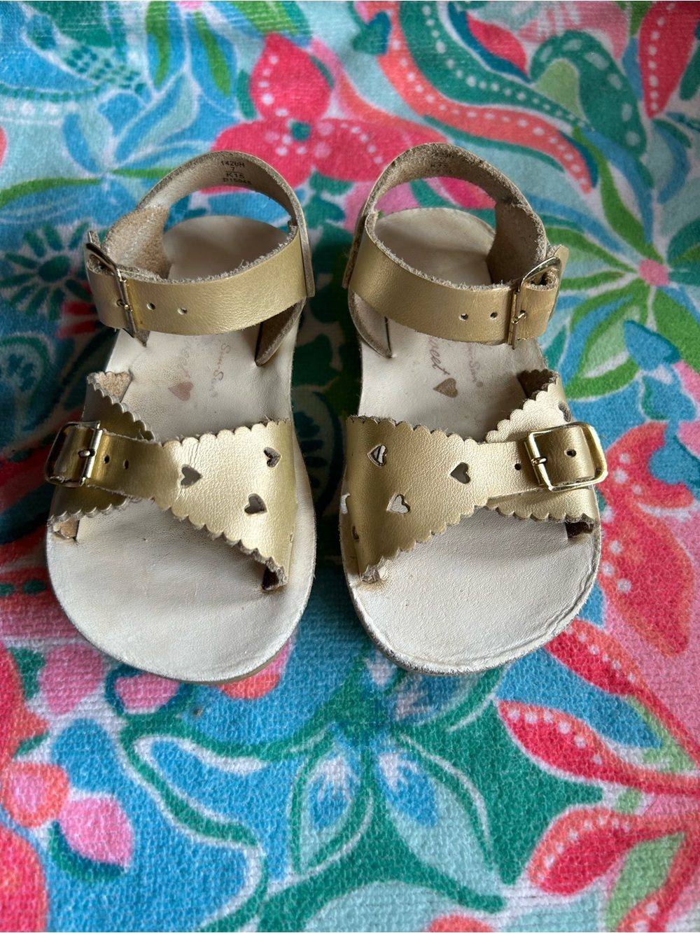 Sun-San gold sandals.